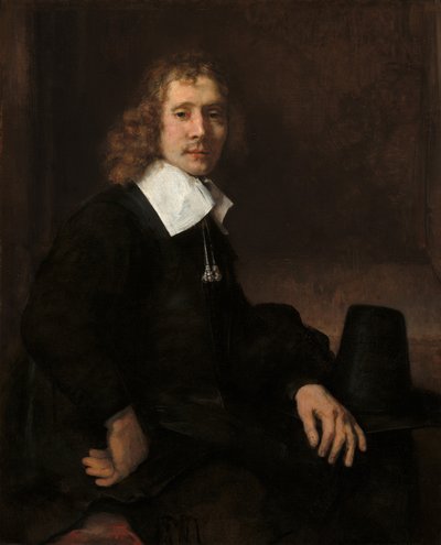 Mladý muž sedící u stolu pravděpodobně Govaert Flinck, c. 1660. od Rembrandt van Rijn