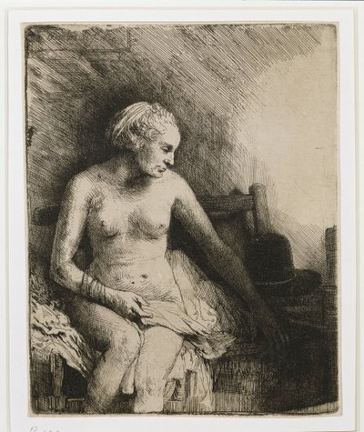 Žena ve vaně s kloboukem vedle ní, 1658 od Rembrandt van Rijn