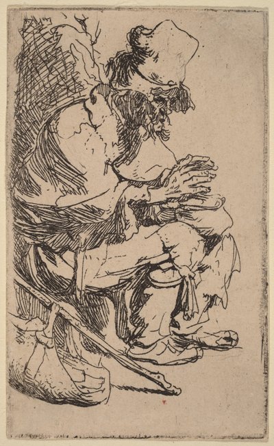 Žebrák sedící u ohřívacího kotlíku a zahřívající si ruce od Rembrandt van Rijn