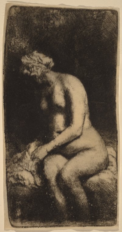 Akt sedící na lavičce s polštářem (žena si myje nohy u potoka) od Rembrandt van Rijn