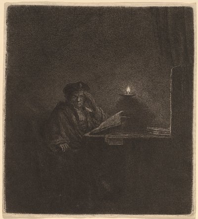 Student u stolu při svíčkách od Rembrandt van Rijn