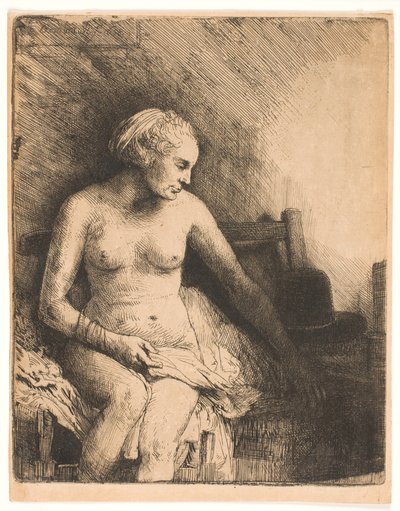 Žena ve vaně, s kloboukem vedle ní od Rembrandt van Rijn