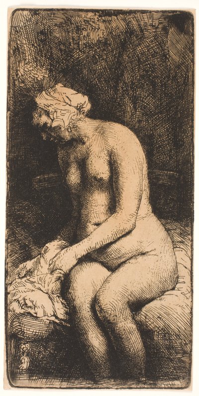 Žena si koupe nohy u potoka od Rembrandt van Rijn