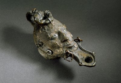 Římské umění: bronzová olejová lampa ve tvaru obličeje. 1. nebo 2. století našeho letopočtu. Španělsko Museo di Ampurias (Empurias) od Roman