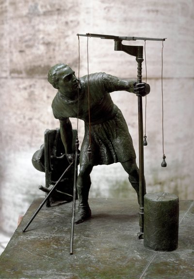 Římské umění: „“gromatik““ Zeměměřič (agrimeners) měří půdu pomocí groma (gruma). Bronzová socha. Řím, Muzeum římské civilizace od Roman Roman