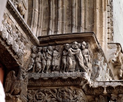 Jidášův polibek, vlys portálu od Romanesque