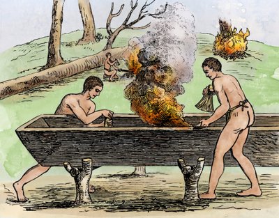 Indiáni vyrábějí kánoi, ukazují kmen stromu u ohně a kopou herbetem. Rytina 1590, autor Theodore De Bry, barevné 19. století. od Theodor de Bry