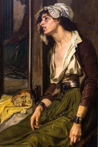 Doktor Pinel při osvobozování duševně chorých v Salpêtrière v roce 1795 od Tony Robert-Fleury
