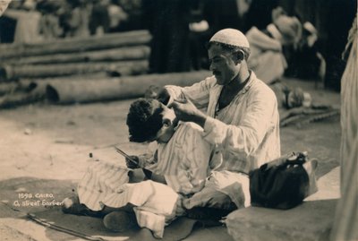 Pouliční holič, Káhira, Egypt, 1936 od Unbekannt