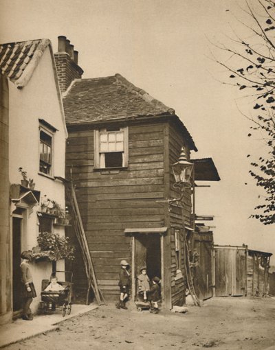Staré domy v Highgate, z jejichž dveří vesničané sledovali autobusy Pass., c1935. od Unbekannt