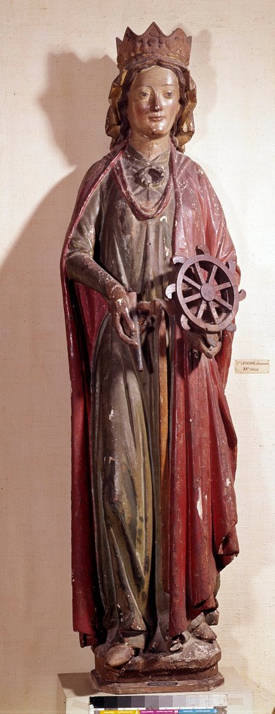 Znázornění svaté Kateřiny Alexandrijské, držící kolový nástroj svého trápení. Polychromovaná dřevěná socha od Unknown artist
