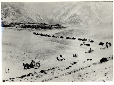 Průkopníci sbírající imigranty z vlakového nádraží a vedou je do Mormon Salt Lake City od William Henry Jackson