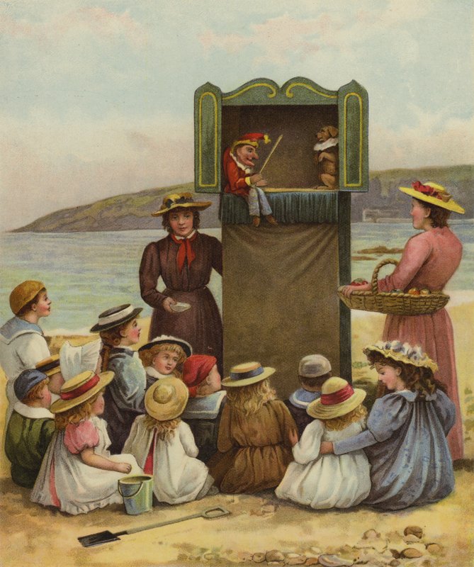 Děti sledují představení Punch and Judy na pláži od English School