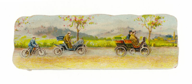 Rušná silnice s auty a cyklisty od American School