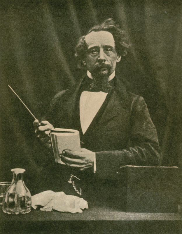 Charles Dickens při čtení, 1859 od English Photographer