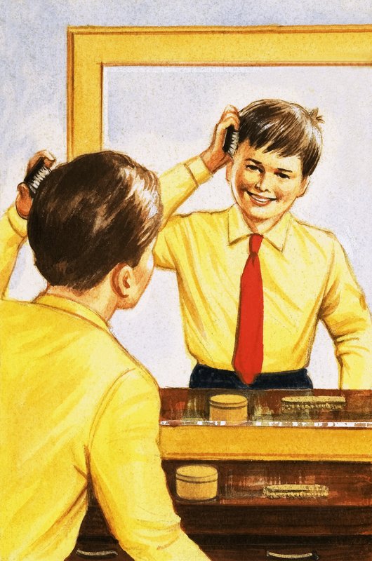 Chlapec si češe vlasy v zrcadle s tenkou vrstvou stříbra. od English School