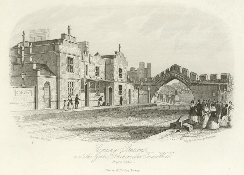 Nádraží Conwy a gotický oblouk v městské zdi, postavený v roce 1847 od English School