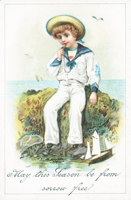 Sailor chlapec sedí na skalách, vánoční přání od English School