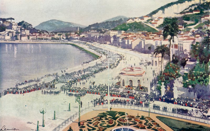 Praia da Lapa a Praca da Gloria, pohled na vojenskou přehlídku 15. listopadu, v den výročí založení Brazilské republiky (barevná litografie) od European School