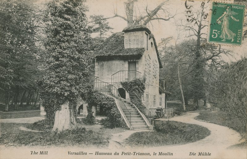 Mlýn v Hameau de la reine, rustikální útočiště postavené pro Marii Antoinettu v parku zámku Versailles poblíž Petit Trianon. Pohlednice odeslána v roce 1913. od French Photographer