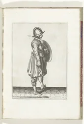 Cvičení Štít a bodec: Voják s připraveným štítem a bodcem na zemi vedle pravé nohy (č. 17), 1618 Nassausche Wapen-Handelinge, van Schilt, Spies, Rappier a Targe: zobrazeno beyde figuerlick, zarámováno po novém