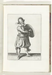 Cvičení The Shield and Spike: The Soldier Draws His Rapier from Behed his Shield (č. 18), 1618 Nassausche Wapen-Handelinge, van Schilt, Spies, Rappier a Targe: vyobrazeny beyde figuerlick a zarámované podle nového řádu [z] (...) Maurits v.