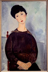 Portrét sedící hnědé dívky namaloval Amedeo Modigliani