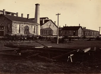 Deska 17. Strojírny v Laramie, z jihozápadu,1869 (foto)