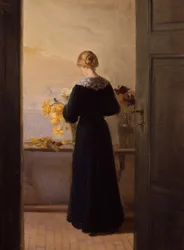 Dívka aranžuje květiny