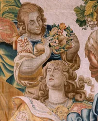 Vlámský gobelín. Seriál Příběh Thésea. Bacchus si bere Ariadnu za manželku (Baco toma a Ariadna por esposa). Devátá tapisérie v sérii. Model Anthonis Sallaert. Výroba Jan Raes mladší, Brusel. Cca 1630.; Tkanina Hedvábí a vlna. Rozměr 392 x 45