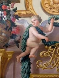 Detail nástěnné malby, zobrazující cherubína držícího vavřínový věnec a věnec, Hodovní dům