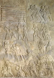 Reliéf zobrazující nosiče přivážející dřevo na pobřeží pro přepravu po moři. z paláce Sargon II, Khorsabad, Irák