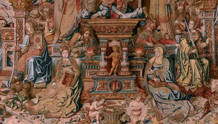 Vlámský gobelín. Seriál Vyznamenání. Víra (La Fe). První tapisérie v sérii. Modelové karikaturisty z okruhu Bernarda van Orleyho a Jana Gossaerta (Mabuse). Výroba Pieter van Aelst, Brusel. Cca 1550. Látka Zlato, stříbro, hedvábí a vlna.