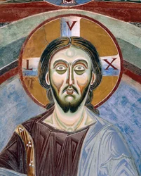 Tvář Krista Pantokratora, Detail románských fresek v byzantském stylu, konec 11. století, kaple svatého Eldrada a svatého Mikuláše, opatství Novalesa, Piemont, Itálie