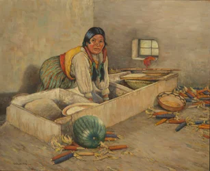 Žena Hopi mele kukuřici