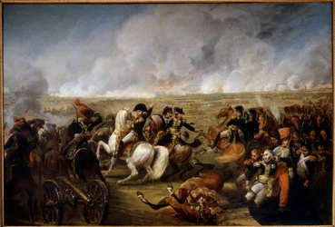 Císař Napoleon I. (1769-1821) v bitvě u Wagramu dne 5.7.1809. Vpravo dva vojáci pomáhali generálu Josephu Marii Dessaixovi (1764-1834), zraněnému během bitvy. Obraz Antoine Carle Verneta (1758-1836)