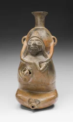 Rituální nádoba představující ženu nesoucí nádobu (Aryballos) a kojící dítě, n. l. 1200-1450 (keramika a pigment)