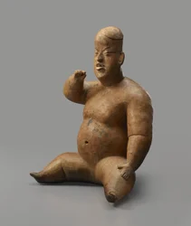 Sedící figura (kamenina se skluzem)