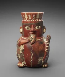 Figurální nádoba s dýmkou a kyjem, c. 600-1000 AD (hliněné nádobí se skluzem)