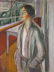 Mladá žena na verandě