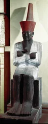 Egyptský starověk: socha faraona Montuhotepa II (nebo Mentuhotepa II). 11. dynastie. Z Deir el Bahari. Ztlumit. 83 cm. Káhira. Egyptské muzeum