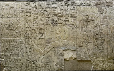 Egyptian antiquite: representation of bearers of offerings. Low relief of the Tomb of the Vizir Ramose (18th dynasty). Luxor, Thebes, Valley of the Nobles Egypt
