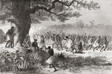 Henry Morton Stanley pozoruje kmen Vouagogos připravující se k boji během své výpravy v roce 1871, ilustrace z knihy "Svět v rukou", vydané v roce 1878.