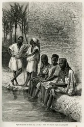 Černí muži a ženy ze Sahary na březích Oued Rir. Rytina E. Bayarda ilustrující Alžírskou Saharu od V. Largeaua, 1874-1878, vydaná v Le Tour du monde pod vedením Édouarda Chartona (1807-1890)
