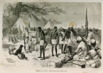 Drzé nosiče expedice zapojené do řetězu, kresba Emile Bayard, pro ilustraci příběhu: Napříč Afrikou, ze Zanzibaru (Tanzanie) do Benguely (Angola), v letech 1872 až 1876, poručík V.H.Cameron. Rytina v Le tour du monde