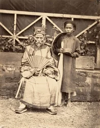 Náčelník vesnice v oficiálním kostýmu, Cochinchina, 1866.