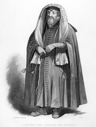 Židovský rabín se obléká pro modlitby, vyryl R. Young, z knihy „World Religion“, vydané nakladatelstvím A. Fullarton & Co. (rytina)