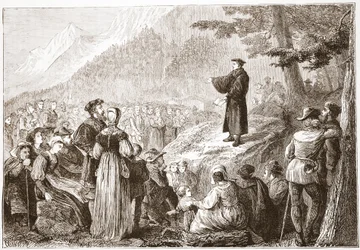 Švýcarský reformátor káže svému stádu na otevřeném poli, ilustrace z Historie protestantismu od Jamese Aitkena Wylie (1808-1890), pub. 1878