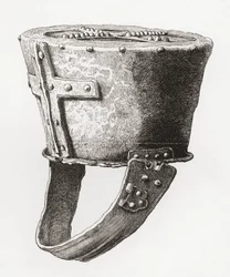 Helma, z Castle Pomeroy, Anglie, pocházející z cca 12. století, z The British Army: Its Origins, Progress and Equipment, vydané v roce 1868.