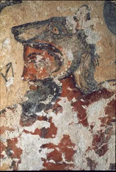 Aita (Eiza), etruský bůh posmrtného života, s vlčí čepicí, detail fresky, 4. století př. n. l.